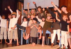 The orphan choir -- nary a fur vest in sight.