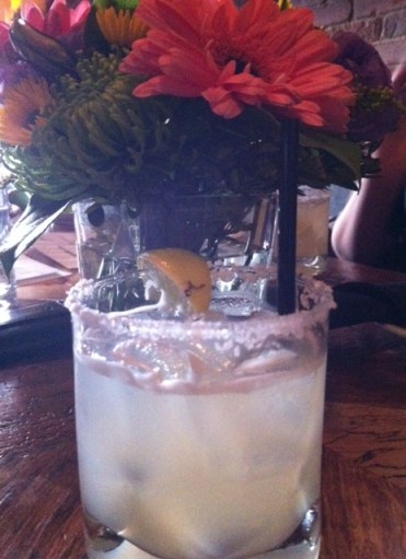 This drink is awesome and I love that it's rimmed with coconut flakes!