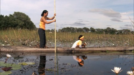 Exploring the Okavango Delta, Botswana by dugout canoe.