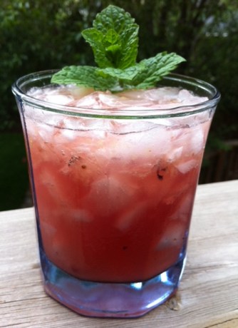 Fresh mint, muddles blueberries and a tot of whiskey will be key to your bliss this weekend.