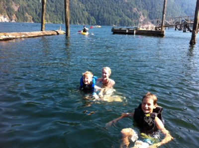 Bennett swims to his honorary auntie while cousin Jack enjoys the water too.