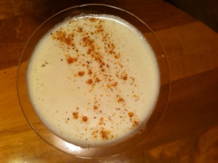 The nutmeg makes a pretty and fragrant garnish on a brandy flip.