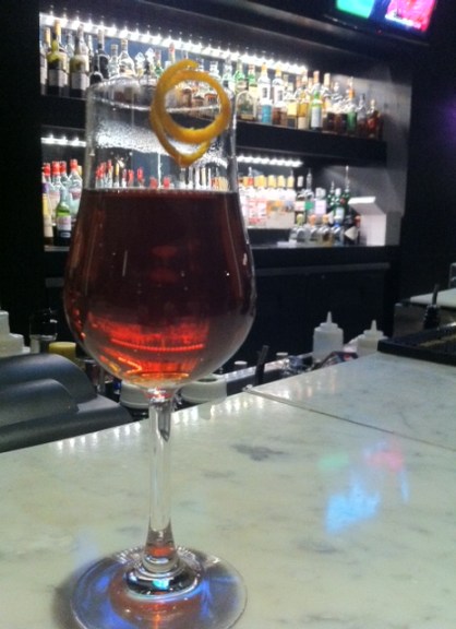 A strong and fruity take on a traditional Blueberry Tea cocktail at Yellow Door Bistro.