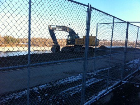 A "hardened" river bank but still no street access. 