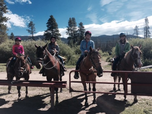 Moms and daughters are ready to ride. I'm riding Lady and Avery is on Midnight.