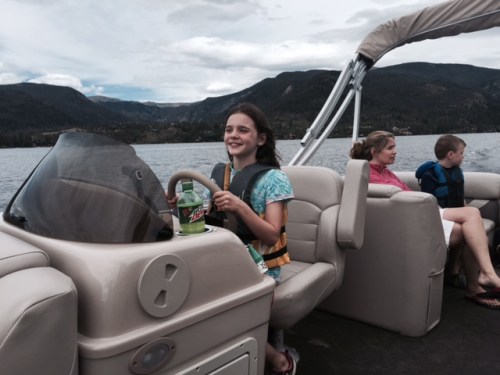 On the poshtoon boat. Everyone got a chance to drive, including Avery and Bennett. All we are missing is a cooler of beer and some tunes.