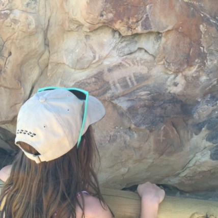 Avery spots a pictograph in Dinosaur National Monument.