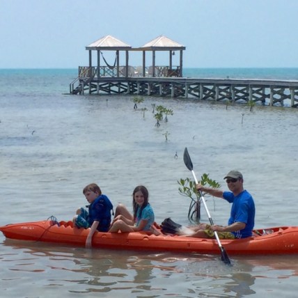 Bennett, Avery and Blake kayak off the dock on Ambergris Caye, Belize.