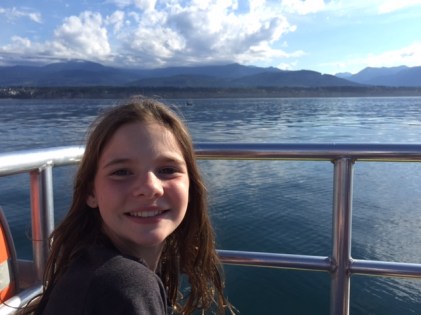 See that tiny speck in the water behind Avery? That's a killer whale!
